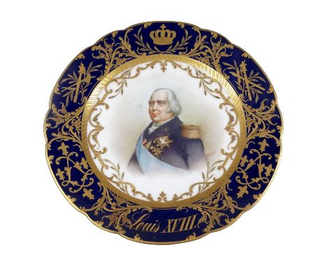 A Sevres cabinet plate - decorated with a bust length portrait of Louis XVIII, within a deep blue border with raised gilt rel