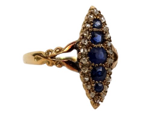 A sapphire and diamond ring - in a marquis setting on a yellow metal band, size S, 3.2g