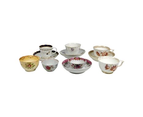 A Flight Worcester cup and saucer - of fluted form, gilt decorated with a blue band, together with another tea bowl and sauce