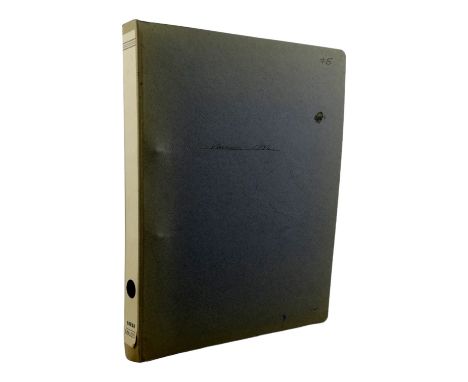 A ring binder of mint stamps.
