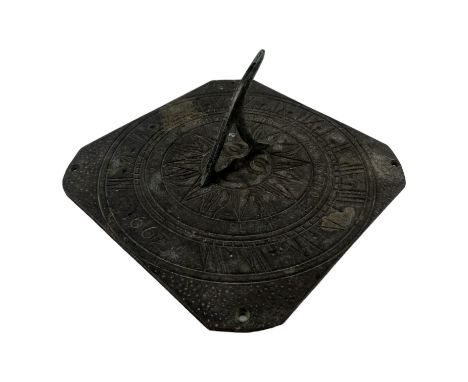 A 20th century brass sundial - with a weathered finish and dated 1667, 24 x 24cm.