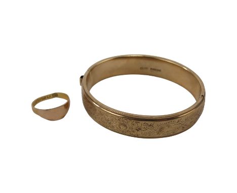 A 9ct gold bangle - foliate engraved, together with a signet ring, 20.2g. (2)