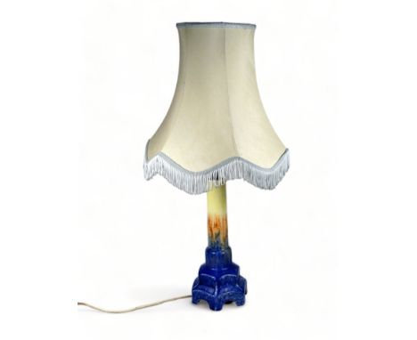 A Ruskin Pottery table lamp - yellow, orange and blue glazes, of tapering column form with a stepped hexagonal base, stamped 