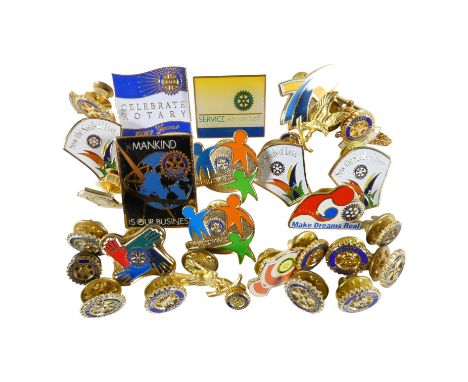 Twenty-seven various Rotary International pin badges. (27)