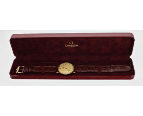 Omega Quartz 9ct gentleman's wristwatch, the champagne dial with baton markers, centre seconds and date aperture, Omega burgu