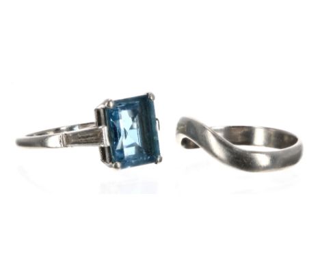 Platinum aquamarine and diamond three stone ring, hallmark for London 1998, emerald-cut aquamarine 2.18ct approx, the shoulde