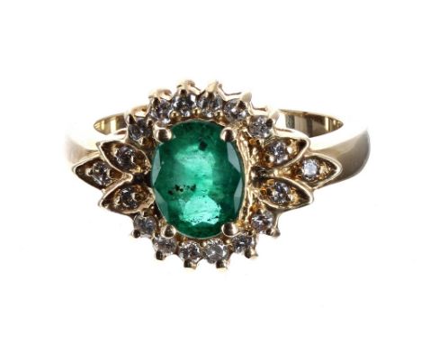 14ct yellow gold emerald and diamond oval cluster ring, the oval emerald 1.07ct approx, in a claw setting of round brilliant-