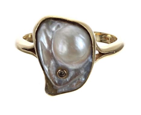 18ct baroque pearl yellow gold ring, set with a small single diamond, head 18mm x 13.5mm, 9gm, ring size V  