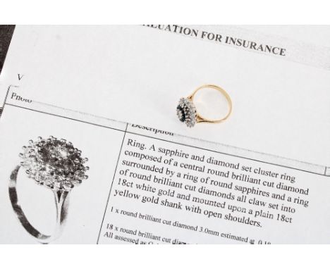 18ct white and yellow gold set sapphire and diamond cluster ring, with a central diamond 0.10ct, within a band of eight round
