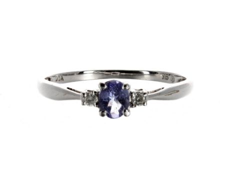 Modern 9ct white gold tanzanite and diamond three stone ring, 1.3gm, ring size O/P