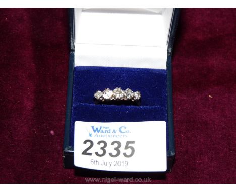 An 18ct platinum set five stone diamond ring, old cut diamond approx. 0.88ct with valuation.