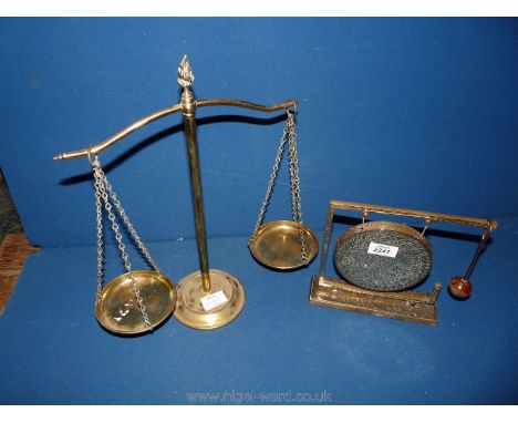 A brass Gong and brass Weighing Scales.