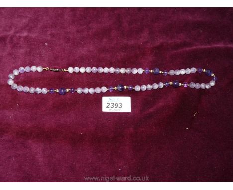 An Amethyst bead necklace.