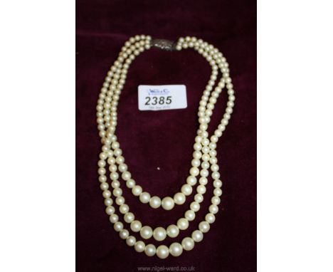 A three string pearl Necklace of good quality with sterling silver and marcasite clasp.