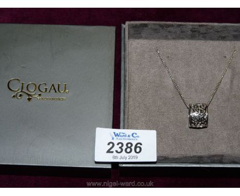 A presentation cased "Clogau Gold" pierced work .925 marked Silver ring Pendant and chain, the chain 17" long approx., 7 gms 