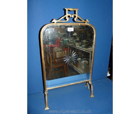 A Brass mirrored Firescreen.