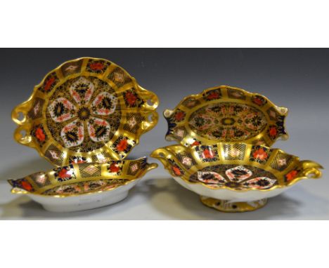 A Royal Crown Derby 1128 pattern twin handled solid gold band footed trinket dish, printed marks to base; another; two oval t