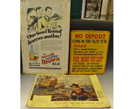 Advertising - a Newcastle Brown Ale poster enamel on tin; a Players medium navy cut poster on board; a no deposit coin in the