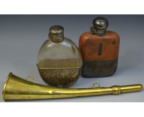A late 19th/early 20th century brass hunting horn, two lanyard loops, 28cm long, c.1900; an E.P.N.S. and leather mounted hip 