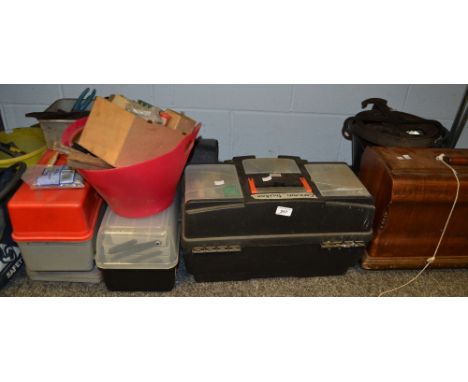 Tools - an iron pulley, vices, oil stones, chisels, cased sewing machine etc.