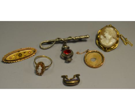 A 9ct gold cameo ring, weight 2.6g; a 9ct gold lock of hair locket; a gold coloured metal cameo brooch, etc.