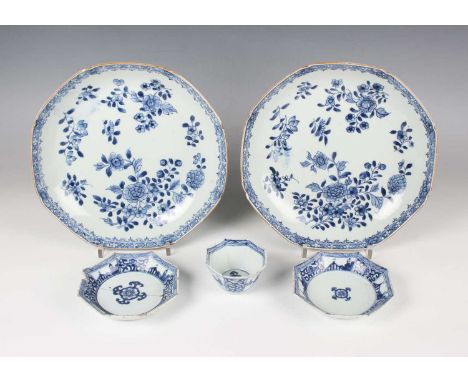 A pair of Chinese blue and white export porcelain octagonal dishes, Qianlong period, each painted with scattered blossoming b