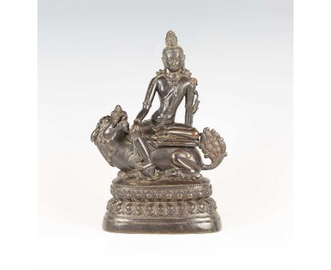 A Sino-Tibetan brown patinated bronze figure of Padmapani, 17th century, modelled in the Pala period style, seated in lalitas