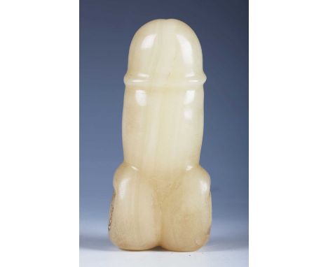 A Chinese white jade phallus, probably 16th century, length 13.4cm. Provenance: the Alain Presencer Collection.