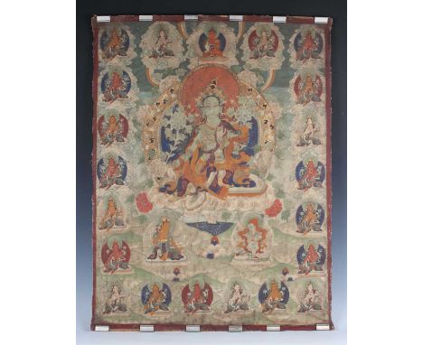 A Tibetan thangka, early to mid-19th century, painted on fabric, depicting White Tara seated in lalitasana on a lotus throne 