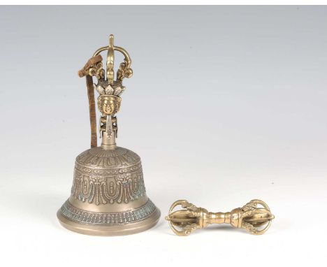 A rare Tibetan bronze and bell metal ghanta and dorje, 16th century, the finely cast ritual bell decorated with a band of Lan