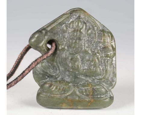A Tibetan green jade Buddha pendant, possibly 15th century, one side carved in low relief with a seated Buddha, of arched for