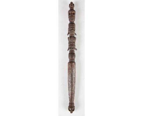 A Tibetan iron danda or khatvanga, 15th/16th century, the decagonal tapering shaft with fine scroll decoration terminating in