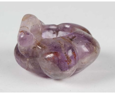 A Chinese carved amethyst quartz brushwasher/water coupe, late Qing dynasty, carved in relief with a squirrel clambering over