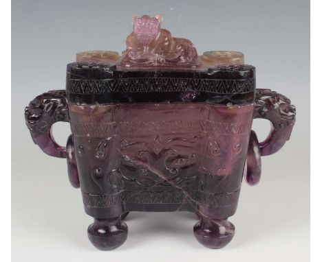 A Chinese archaistic carved amethyst quartz jar and cover, 20th century, of rectangular tapering form with rounded corners, t