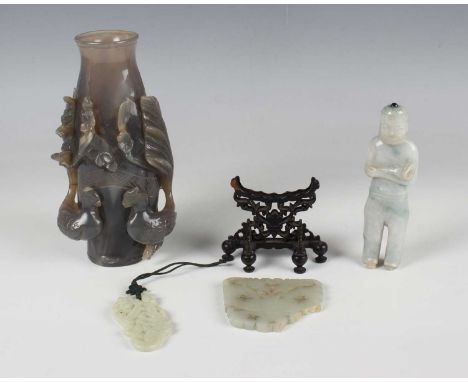 A Chinese agate vase, 20th century, carved in relief and pierced with two birds, height 17cm, together with a Chinese carved 