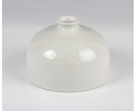 A Chinese white glazed porcelain beehive water coupe, mark of Kangxi but probably 20th century, moulded in low relief with th