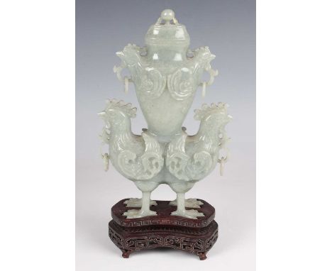 A Chinese pale celadon jade cockerel vase and cover, 20th century, carved in the form of two conjoined cockerels standing bac