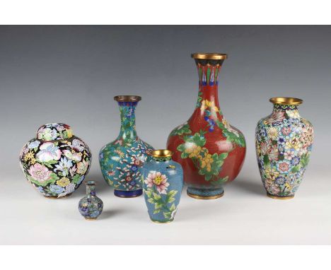A Chinese cloisonné bottle vase, mid-20th century, decorated with polychrome flowers on a turquoise ground, height 20.5cm, to