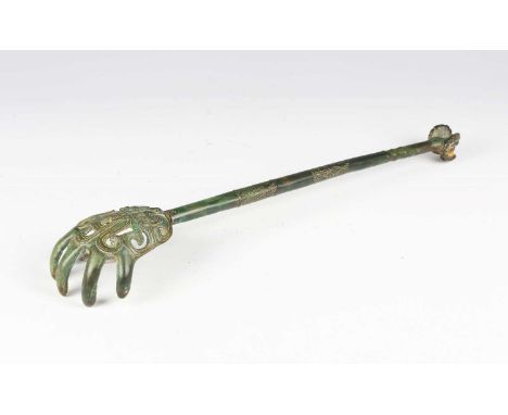 A rare Chinese bronze ceremonial hand, possibly Shang/Zhou dynasty or later, with verdigris patination, the hand shaped termi