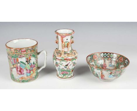 A Chinese Canton famille rose medallion mug, mid to late 19th century, the cylindrical body typically painted and gilt with p