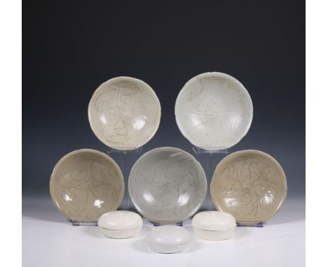 China, a collection of five celadon-glazed bowls and three white-glazed cosmetics boxes and covers, Northern Song dynasty, 10