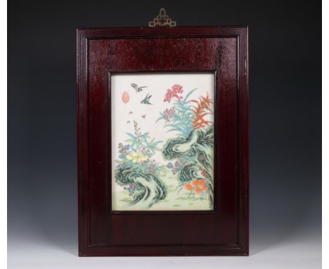 China, famille rose porcelain floral tile, 20th century, painted with birds and insects among various flowers, seal, in wood 