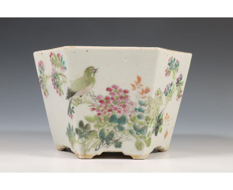 China, a hexagonal famille rose porcelain flower-pot, late Qing dynasty (1644-1912), decorated with a bird perched on floweri