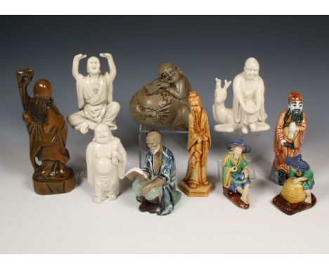 China, collection of ten various figures, mainly 20th century, in various materials, mainly ceramic, comprising figures such 