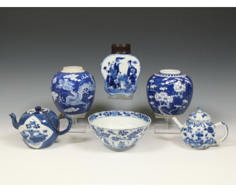 China, a collection of blue and white porcelain, 18th-20th century, comprising a floral bowls, a teapot and cover, a powder-b