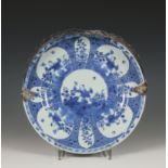 China, a silver-mounted blue and white porcelain dish, Kangxi period (1662-1722), the silver later,