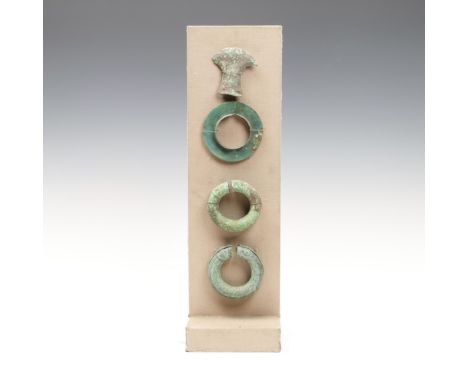 Thailand, Ban Chiang Period, three bronze bracelets and a hand axe, ca. 500-300 BC L. 4,5 - diam. 9,5 cm. mounted [4]
