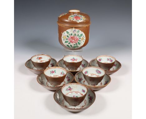 China, a collection of café-au-lait glazed famille rose porcelain, Qianlong period (1736-1795), comprising a set of six cups 