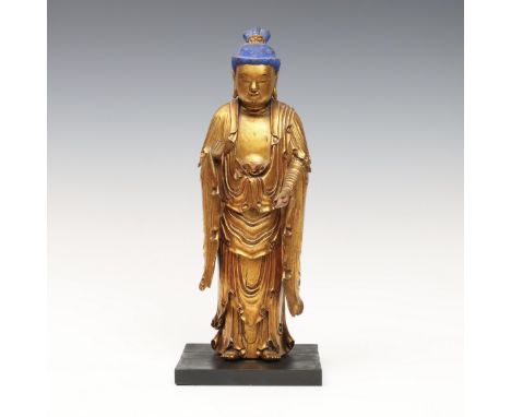 China, a gilt-lacquered wood sculpture of the Bodhisattva Mahāsthāmaprāpta, 18th-19th century. with downcast eyes, a finely c