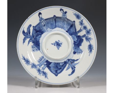 China, a blue and white porcelain dish, Kangxi six-character mark and of the period (1662-1722), decorated around the rim wit
